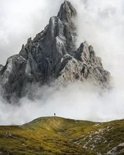 A rock spire in cloud